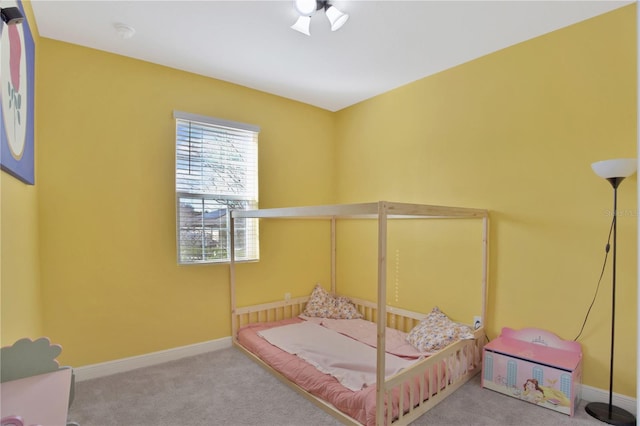 bedroom featuring carpet