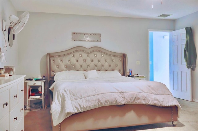 carpeted bedroom with visible vents