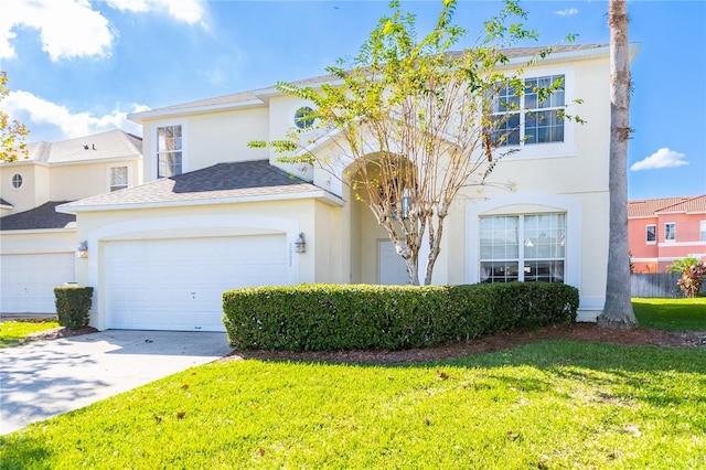 view of front of house featuring a garage and a front yard