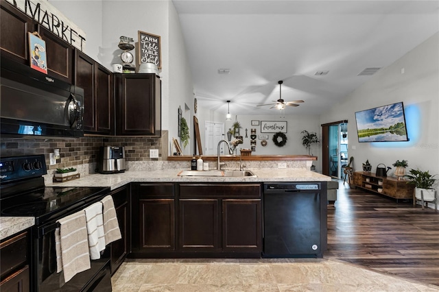 kitchen with kitchen peninsula, ceiling fan, dark brown cabinets, black appliances, and sink