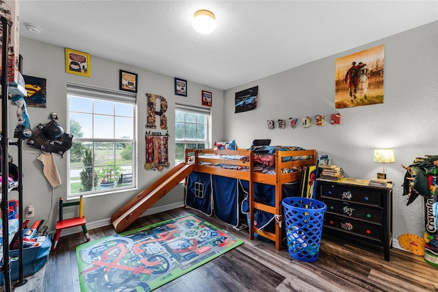 bedroom featuring hardwood / wood-style flooring