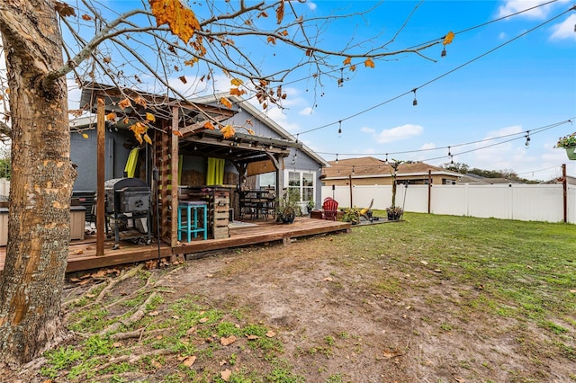 view of yard with a deck