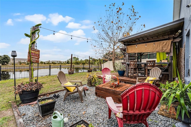 view of patio / terrace featuring a water view