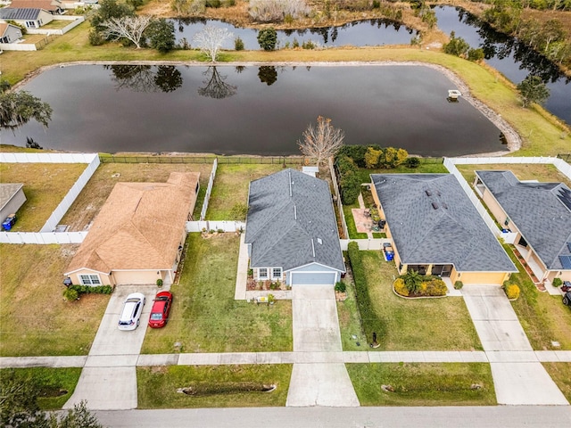 drone / aerial view with a water view