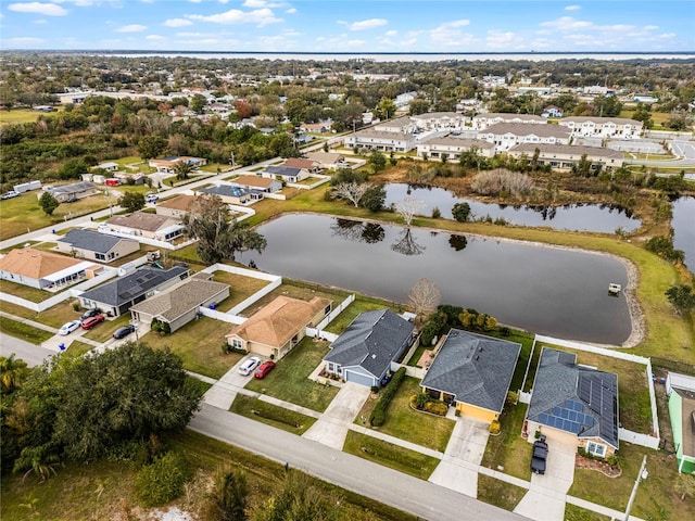 bird's eye view with a water view