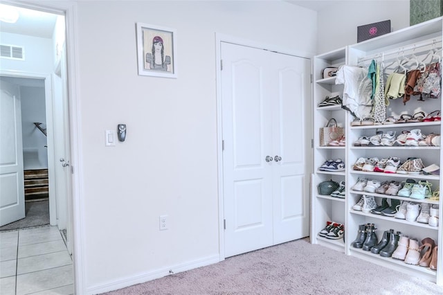 interior space with light colored carpet