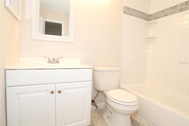 full bathroom featuring tiled shower / bath combo, vanity, and toilet