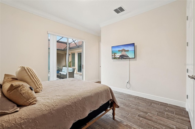 bedroom with crown molding