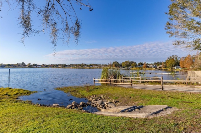 view of water feature with a dock