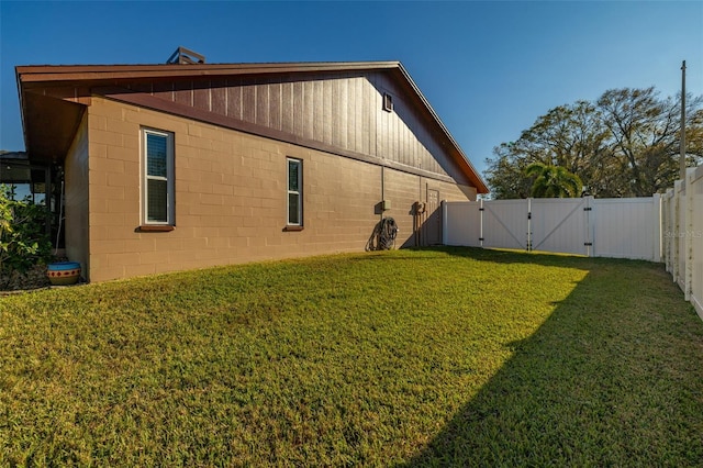 view of property exterior featuring a yard