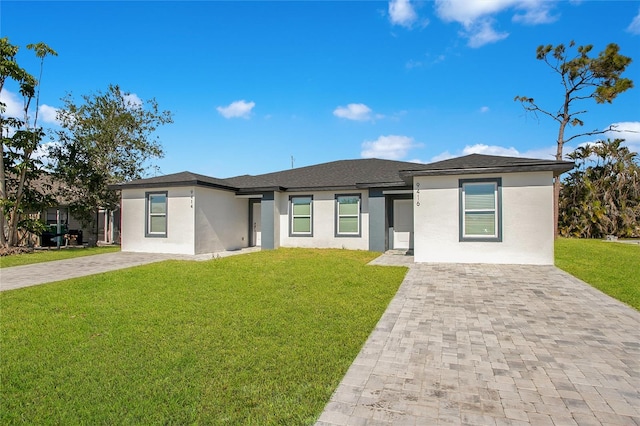 view of front of property with a front lawn