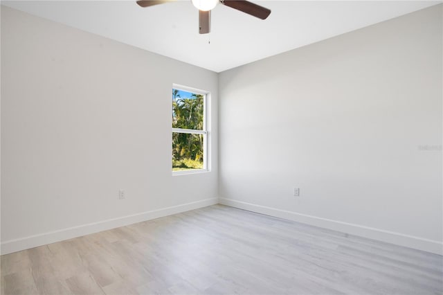 spare room with ceiling fan and light hardwood / wood-style flooring