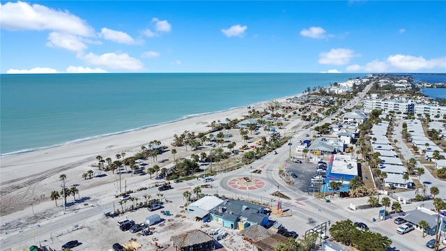 bird's eye view featuring a beach view and a water view