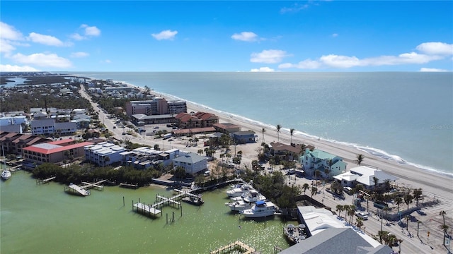 aerial view featuring a water view and a view of the beach