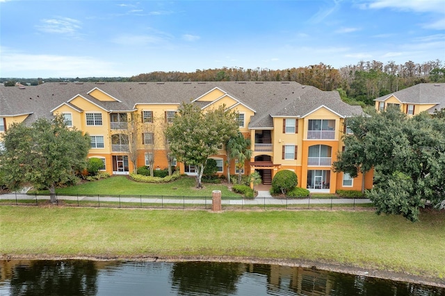 exterior space with a water view