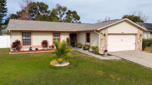 single story home with a garage and a front lawn