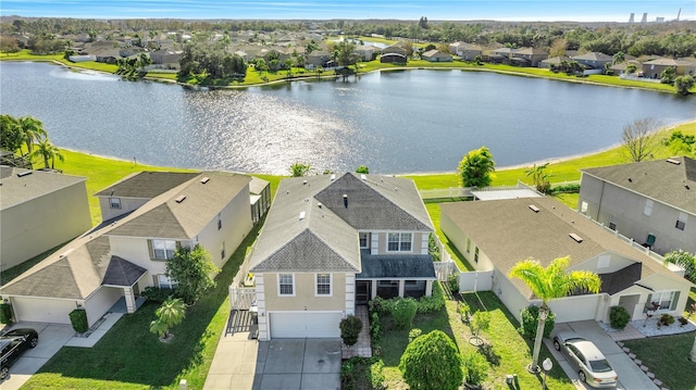 drone / aerial view featuring a water view