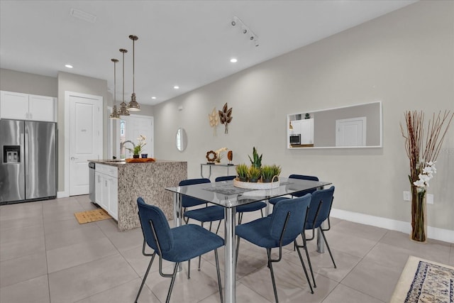 view of tiled dining space