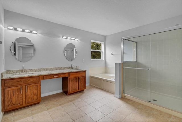 bathroom with shower with separate bathtub, vanity, and tile patterned floors