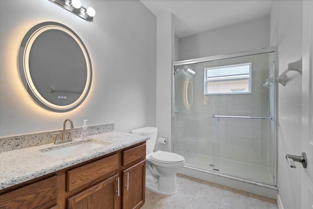 bathroom with toilet, walk in shower, tile patterned floors, and vanity