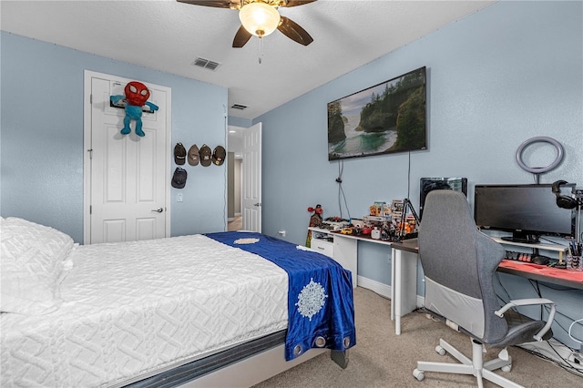 bedroom featuring carpet, visible vents, ceiling fan, and baseboards