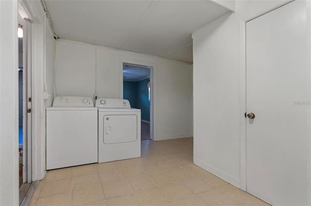 laundry area with washing machine and clothes dryer