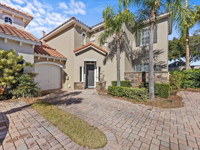 220 Brunello Dr, Davenport, FL 33897 - mediterranean / spanish-style house with a garage