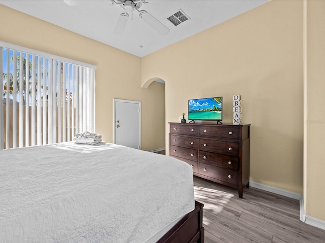 bedroom featuring ceiling fan and light wood-type flooring