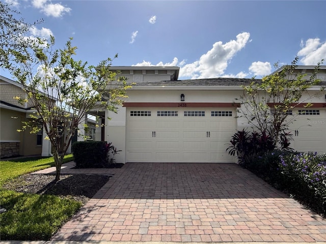 view of front of home featuring a garage