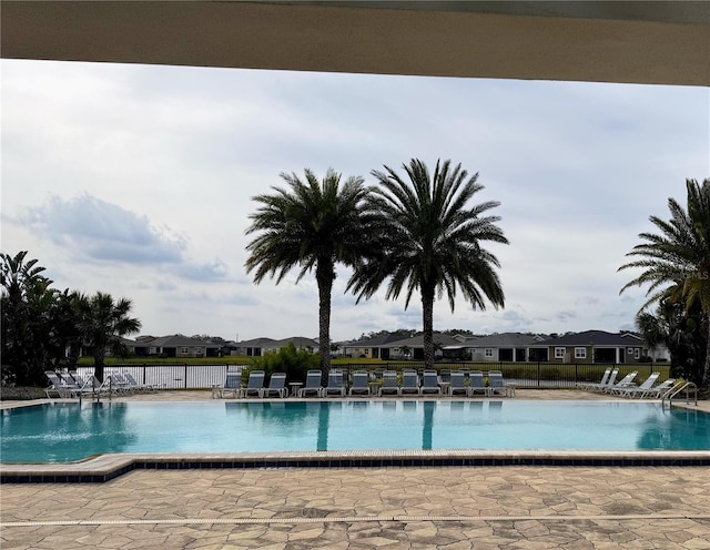 view of pool featuring a patio