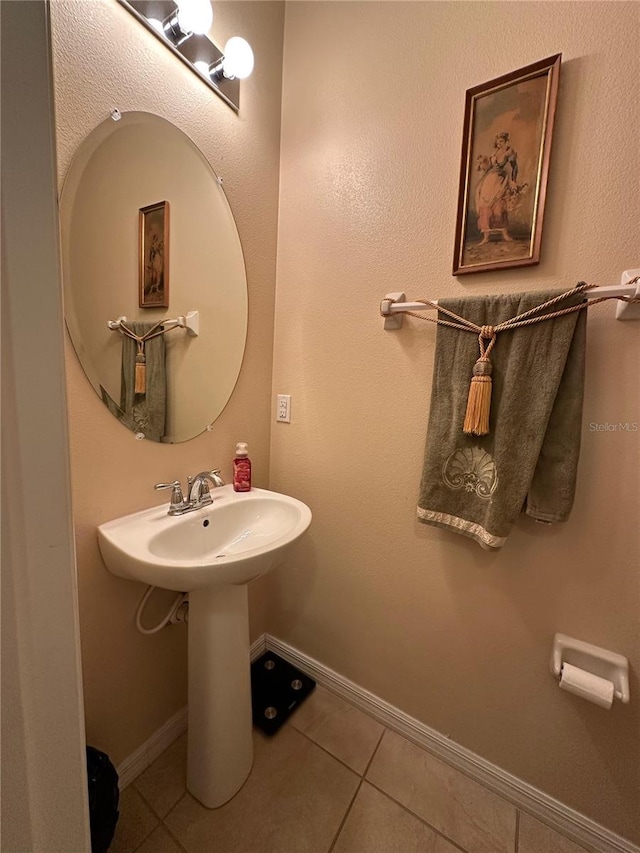 bathroom featuring tile patterned flooring