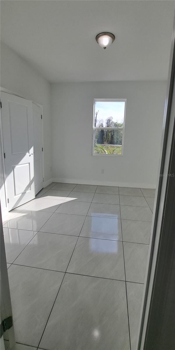 view of tiled empty room