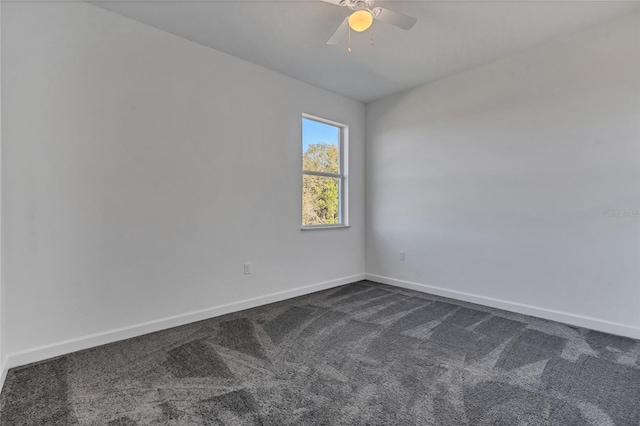 empty room with carpet flooring and ceiling fan