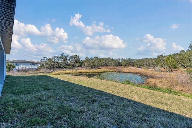 view of yard with a water view