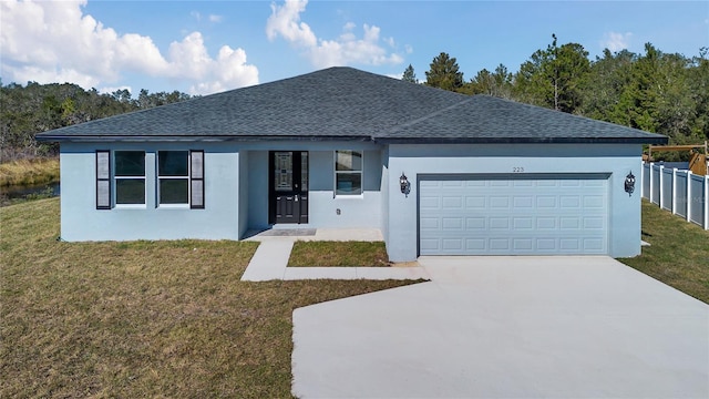 single story home with a front lawn and a garage