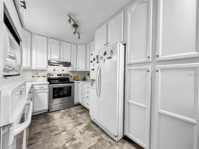 kitchen featuring tasteful backsplash, white cabinets, stainless steel range with electric stovetop, stacked washer and dryer, and white refrigerator with ice dispenser