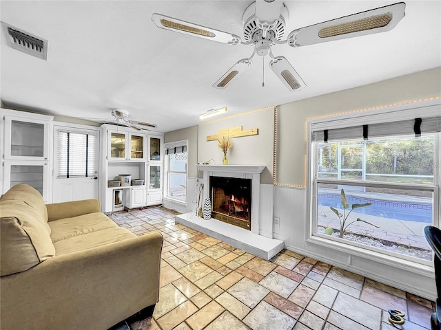 living room with ceiling fan