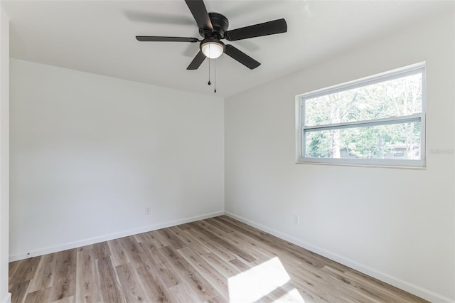 unfurnished room with ceiling fan and light hardwood / wood-style floors