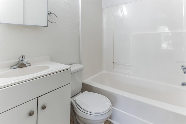 full bathroom with washtub / shower combination, vanity, and toilet