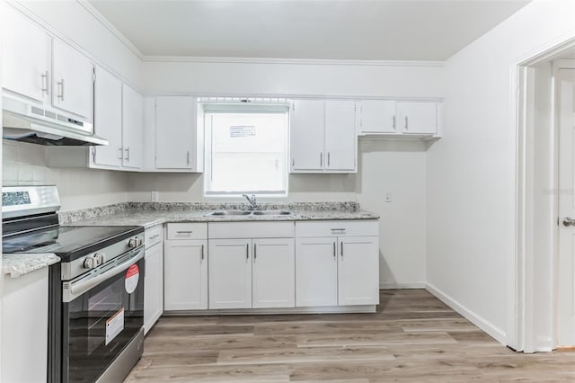 kitchen with white cabinetry, stainless steel electric range oven, sink, and light stone countertops