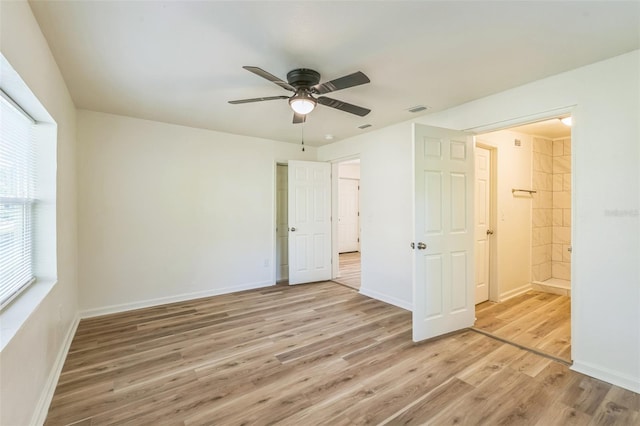 unfurnished bedroom featuring ceiling fan and light hardwood / wood-style floors