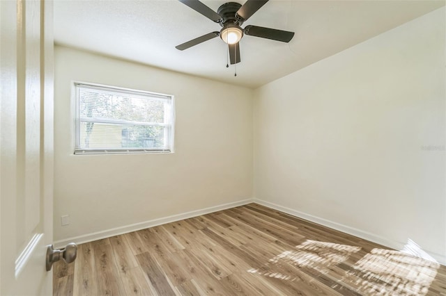 unfurnished room featuring ceiling fan and light hardwood / wood-style flooring