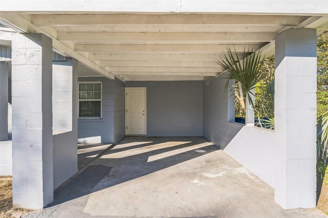 view of patio / terrace with a carport