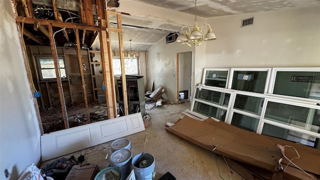 misc room featuring an inviting chandelier and visible vents