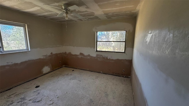 spare room featuring a ceiling fan