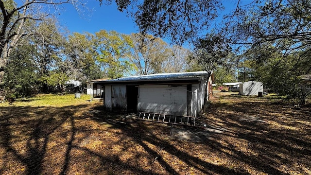 view of outbuilding featuring an outdoor structure