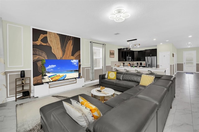 living room featuring a textured ceiling