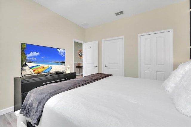 bedroom featuring light wood-type flooring