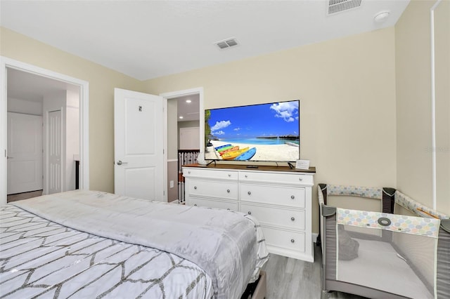 bedroom featuring light wood-type flooring