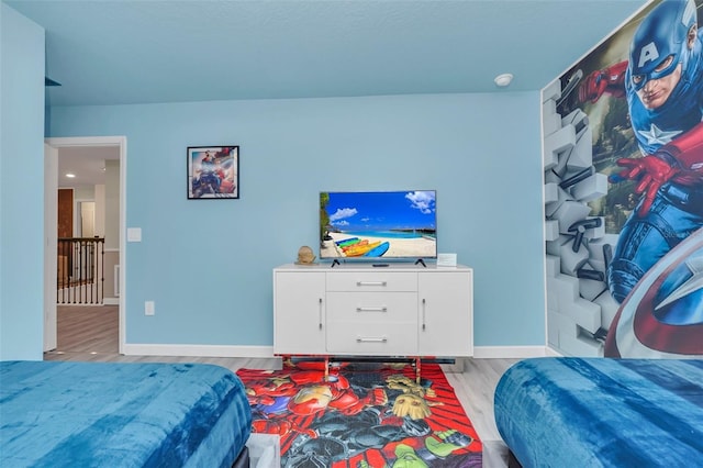 bedroom with light hardwood / wood-style floors